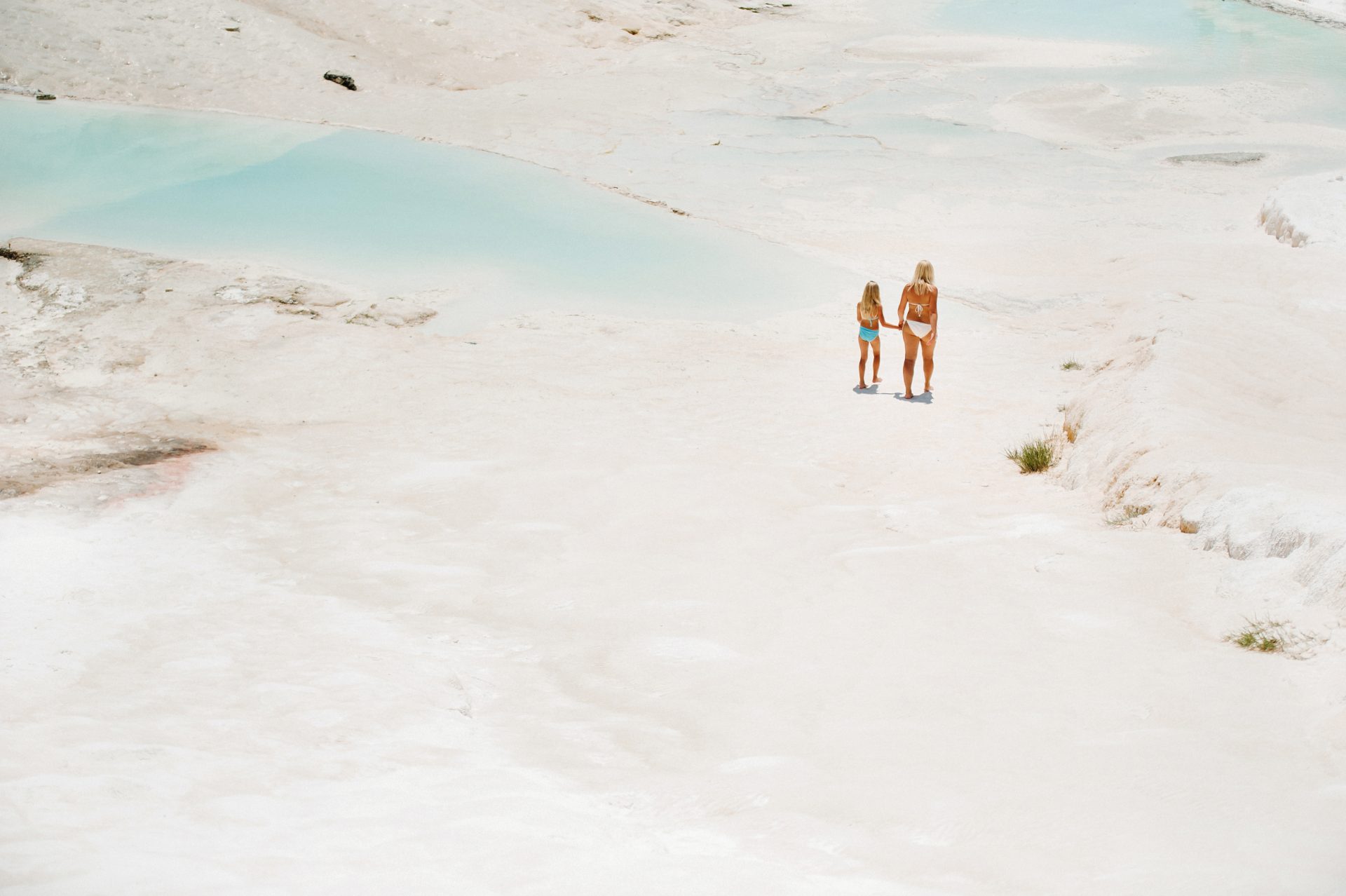 a little girl with her mother in bathing suits and 2022 01 30 06 04 49 utc