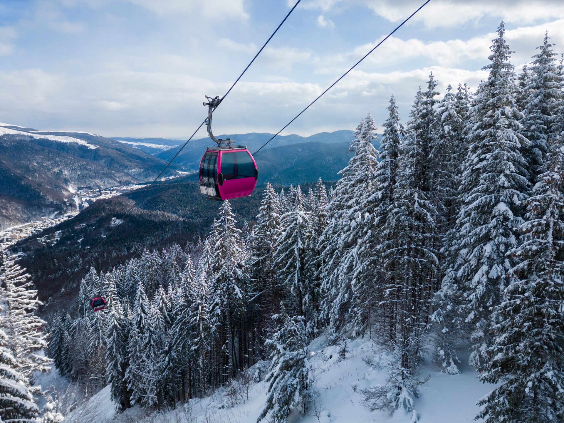 modern ski lift gondola against snowcovered fir fo 2023 02 15 03 46 38 utc