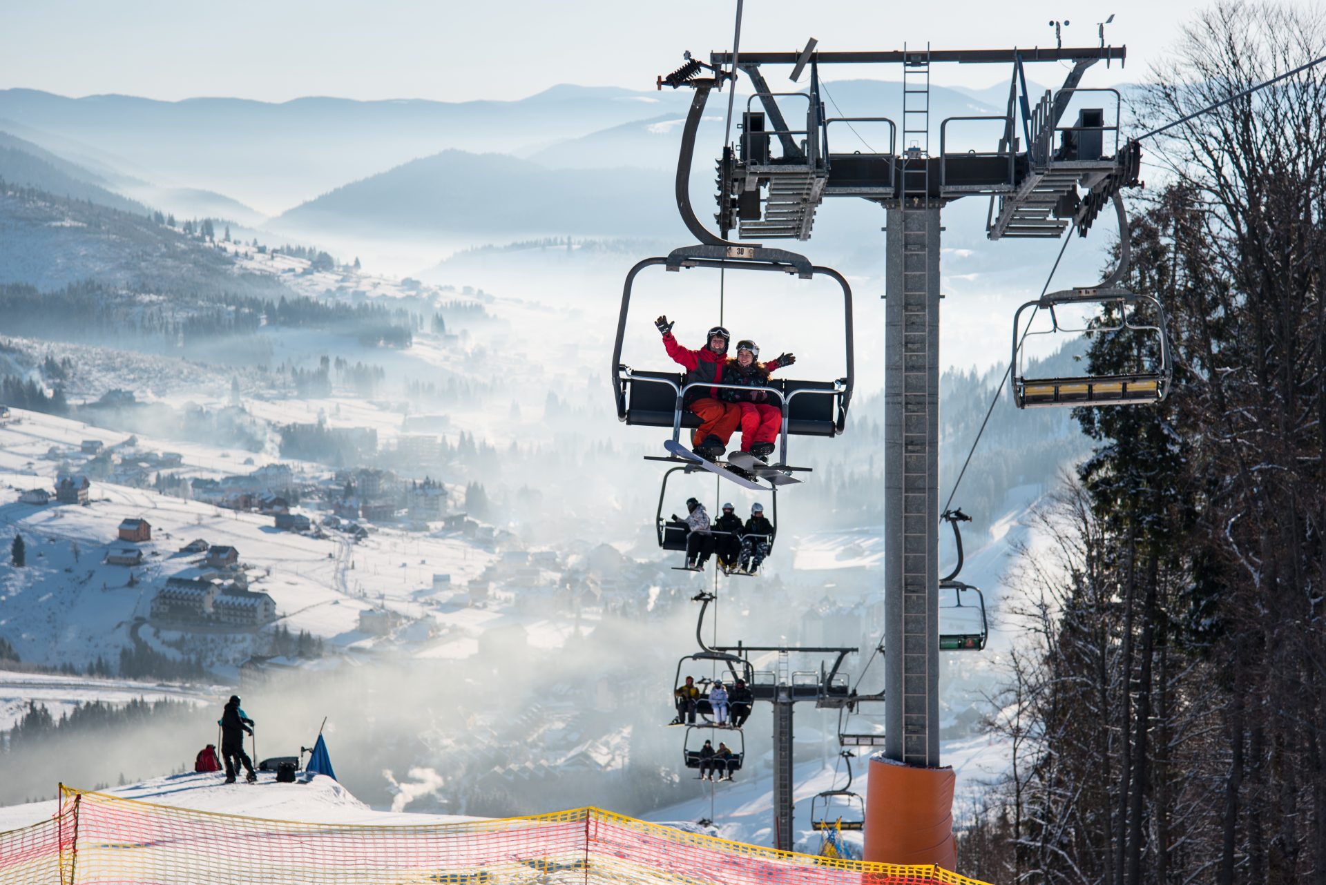 snowboarders and skiers on cable car at ski resort 2022 05 10 23 54 29 utc