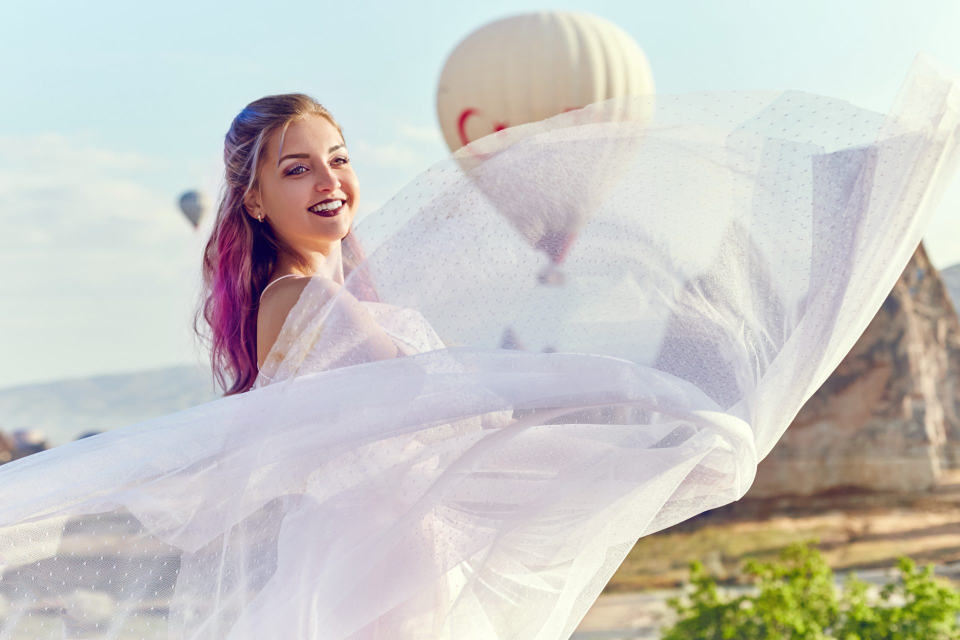 woman in a long dress on background of balloons in 2023 02 17 21 49 16 utc